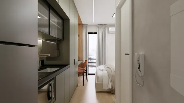 Projeto em 3D de um studio do LM Urban Flex Bela Cintra, com cozinha em linha, mesa de trabalho e cama junto à janela