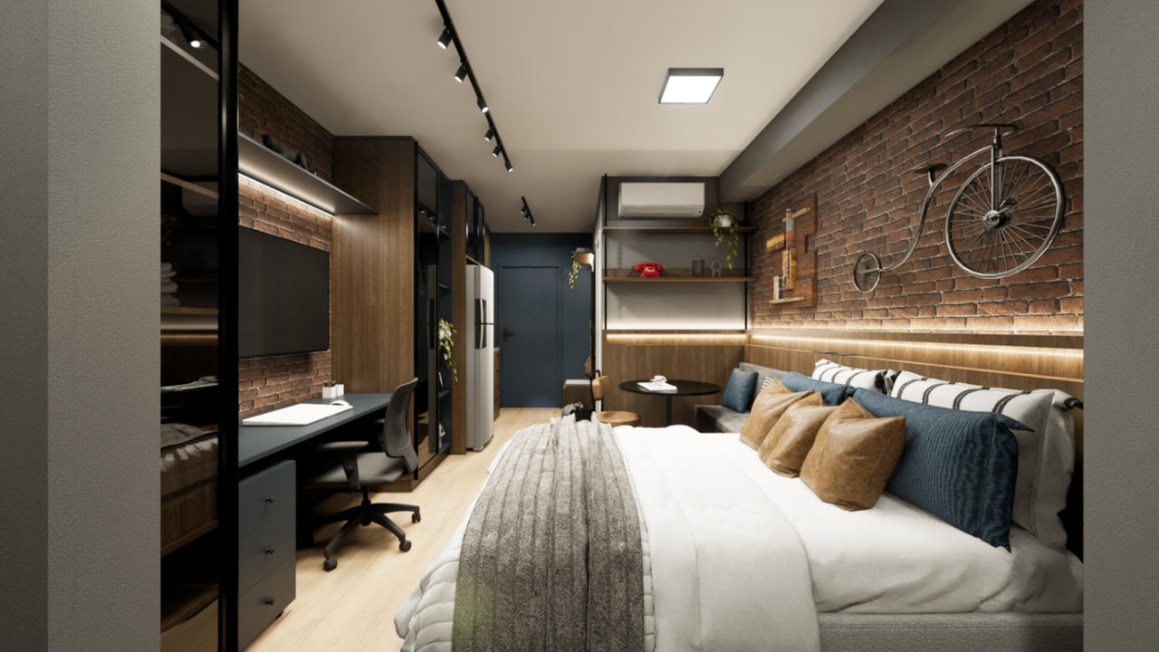 Studio com parede de tijolos, estante com bicicleta e cama com almofadas, projeto Bewild